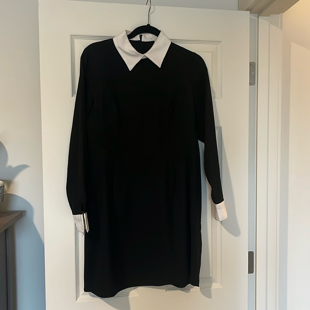 No name brand. Good Wednesday Adams dress. Worn once.